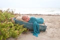 Newborn Baby Boy Sleeping in a Tiny Boat Royalty Free Stock Photo