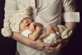 Newborn baby boy smiling in woolen hat, sleeping Royalty Free Stock Photo