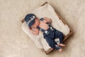 Newborn Baby Boy Wearing a Hat and Suspenders Royalty Free Stock Photo