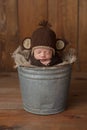 Newborn Baby Boy Wearing a Monkey Hat