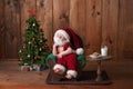 Newborn Baby Boy Wearing a Santa Suit with Beard Royalty Free Stock Photo