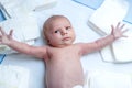 Newborn baby on changing table with diapers Royalty Free Stock Photo