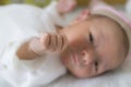 Newborn baby, close-up hand and fingers on bed Royalty Free Stock Photo