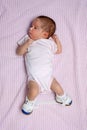 Newborn with Club Foot Wearing Orthopedic Shoes