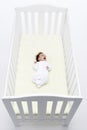 Newborn Baby In Cot Royalty Free Stock Photo