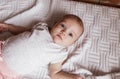 a newborn baby in a crib, the concept of children and the birth of a close-up Royalty Free Stock Photo