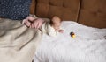 a newborn baby in a crib, the concept of children and the birth of a close-up Royalty Free Stock Photo