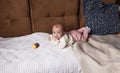 a newborn baby in a crib, the concept of children and the birth of a close-up Royalty Free Stock Photo