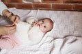 a newborn baby in a crib, the concept of children and the birth of a close-up Royalty Free Stock Photo