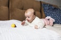 a newborn baby in a crib, the concept of children and the birth of a close-up Royalty Free Stock Photo