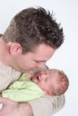 Newborn baby crying in the arms of his papa Royalty Free Stock Photo