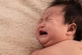 Newborn baby crying sick fever, get flu check up at clinic, Asian child infant 3-4month fussy screaming unhappy angry, hungry in