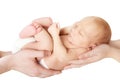 Newborn Baby in Family Hands, Sleeping New Born Kid on White, Parents Care Royalty Free Stock Photo