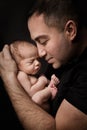 Newborn Baby and Father Portrait, Man holding New Born Kid on Hands, Parents Care Royalty Free Stock Photo