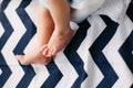 Newborn baby feet and legs.