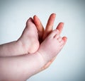 Newborn baby feet parent holding Royalty Free Stock Photo