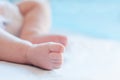 Newborn baby feet. Photo with selective focus and a soft natural Royalty Free Stock Photo