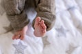 Newborn baby feet and tiny toes. View from above