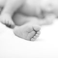 Newborn baby foot detail. Baby care Royalty Free Stock Photo