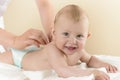 Newborn Baby getting oil massage Royalty Free Stock Photo