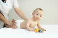 Newborn Baby getting oil massage Royalty Free Stock Photo