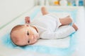 Newborn baby girl on changing table Royalty Free Stock Photo