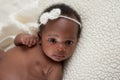 Newborn Baby Girl on Faux Sheepskin Blanket Royalty Free Stock Photo