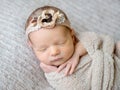 Newborn baby girl swaddled in wrap Royalty Free Stock Photo
