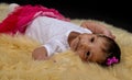 Newborn Baby girl laying on a soft blanket Royalty Free Stock Photo