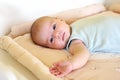 Newborn baby girl is lying on changing table Royalty Free Stock Photo