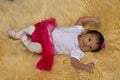 Newborn Baby girl on a plush fur rug Royalty Free Stock Photo