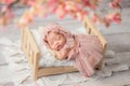 Newborn baby girl sleeping on bed Royalty Free Stock Photo