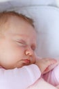 Newborn baby girl sleeping in a cradle Royalty Free Stock Photo