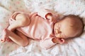 Newborn baby girl sleeping in her crib Royalty Free Stock Photo
