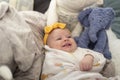 Newborn baby girl smiling at her mommy. Royalty Free Stock Photo