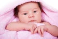 Newborn baby girl on a soft pink terry towel Royalty Free Stock Photo