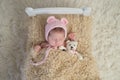 Newborn Baby Girl with Stuffed Bear