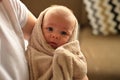 Newborn baby girl in towel after bath Royalty Free Stock Photo