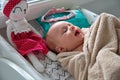 Newborn baby girl in towel after bath Royalty Free Stock Photo