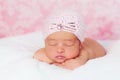 Newborn Baby Girl Wearing a Pink Flapper Style Hat Royalty Free Stock Photo