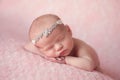 Newborn Baby Girl Wearing a Rhinestone Headband Royalty Free Stock Photo