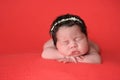 Newborn Baby Girl Wearing a Rhinestone Headband Royalty Free Stock Photo