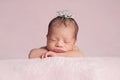 Newborn Baby Girl Wearing a Rhinestone Princess Crown Royalty Free Stock Photo