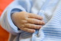Newborn baby hand (Close-up, soft focus)