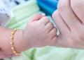 Newborn baby hand, Holding hands with mom Royalty Free Stock Photo