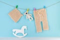 Newborn baby hat and pants on clothespins Royalty Free Stock Photo