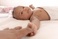Newborn baby holding dad`s finger Royalty Free Stock Photo