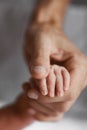 Baby is holding his mothers hand Royalty Free Stock Photo