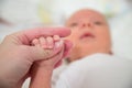 Newborn Baby Holding Mother Hand, Mom Finger and New Born Kid Royalty Free Stock Photo