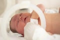 A newborn baby lies in boxes in the hospital Royalty Free Stock Photo
